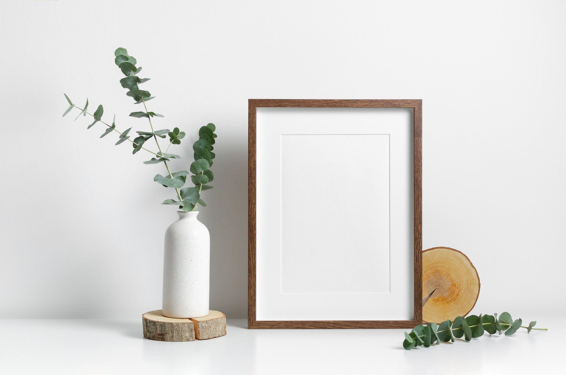 Art frame mockup in white room interior